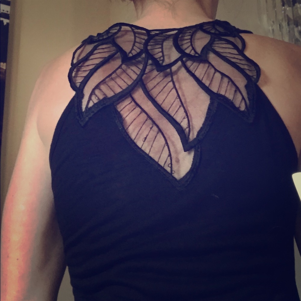 Black tunic sheer with design on back